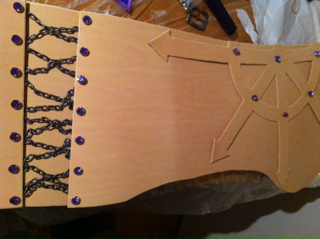 Pieces cut, testing location of chain and rhinestones.